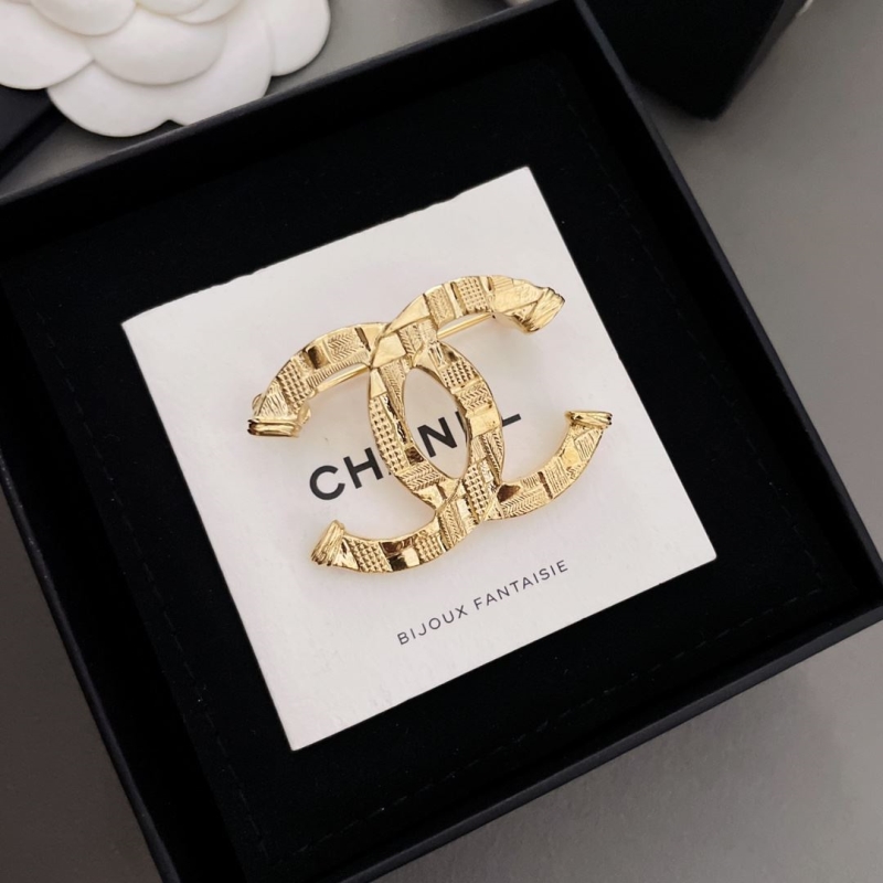 Ch**el brooches